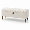 Banc de rangement en bois et tissu beige avec détails en cuir
